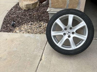 Four Acura Silver 17" 5-Spoke Wheel with used tires