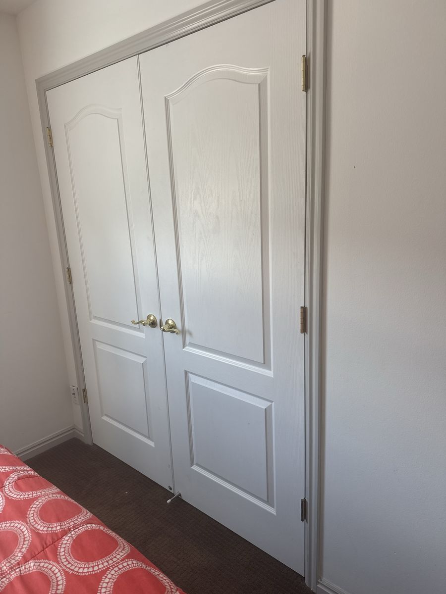 White Interior Doors with Brass Hardware