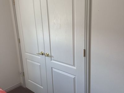White Interior Doors with Brass Hardware