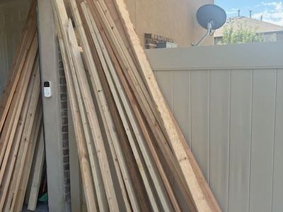 Assorted Lumber Wood Planks - 9 2x4 10' and 14 and 14 2x4 7'6" boards.