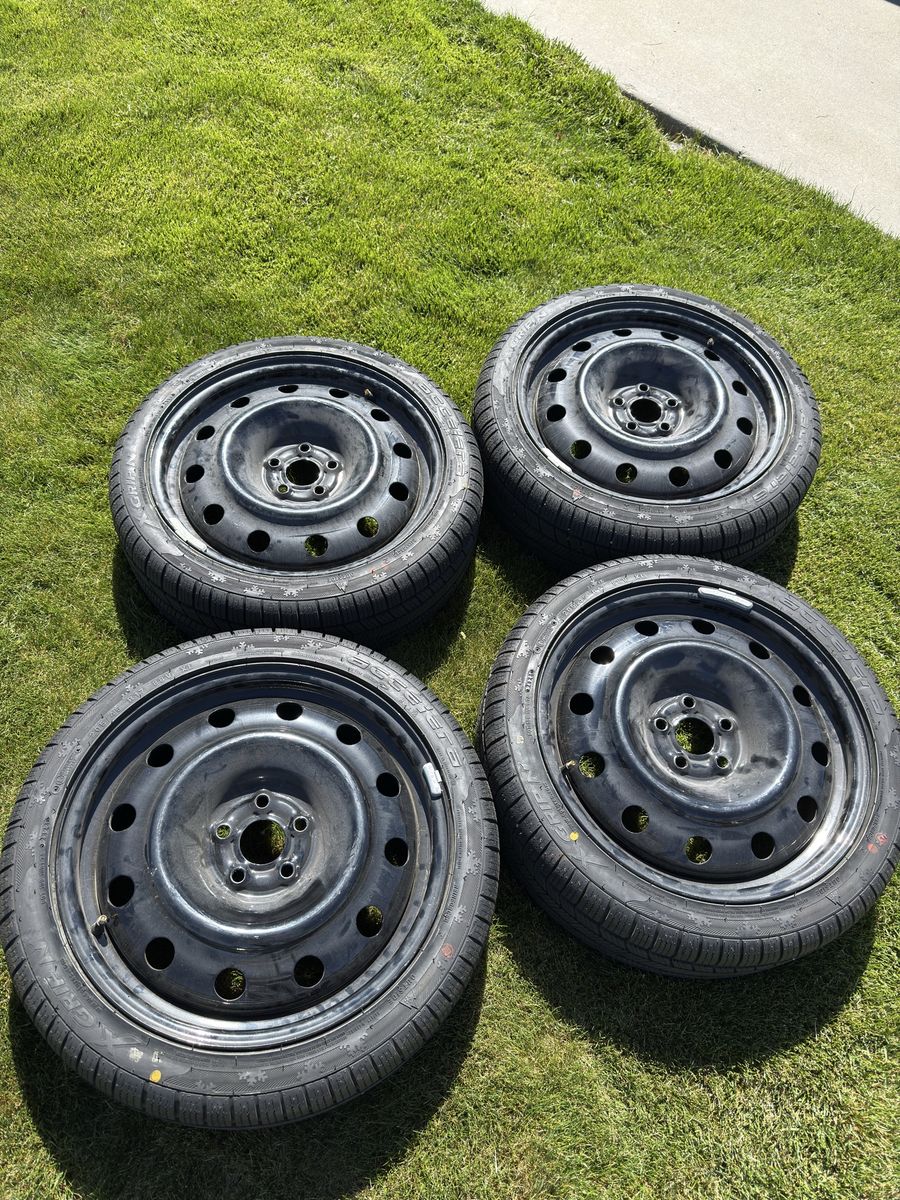 205/45/17 snow tires w/ 5x100 black steelies