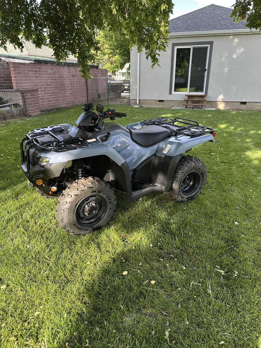 2021 Honda Rancher and trailer.