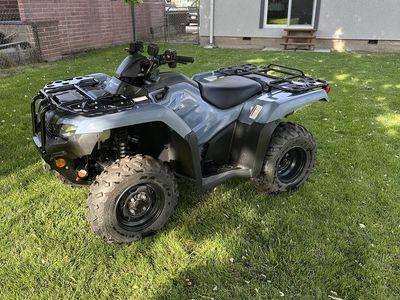 2021 Honda Rancher and trailer.