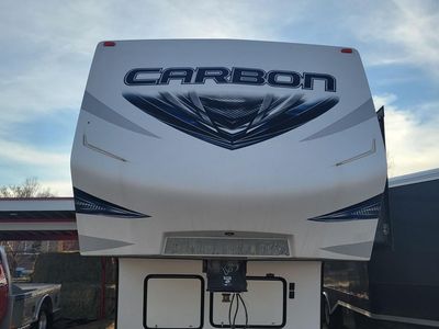 2017 Keystone Carbon 347 Toy Hauler Travel Trailer - Cummins Onan Generator, 3 Slide-Outs