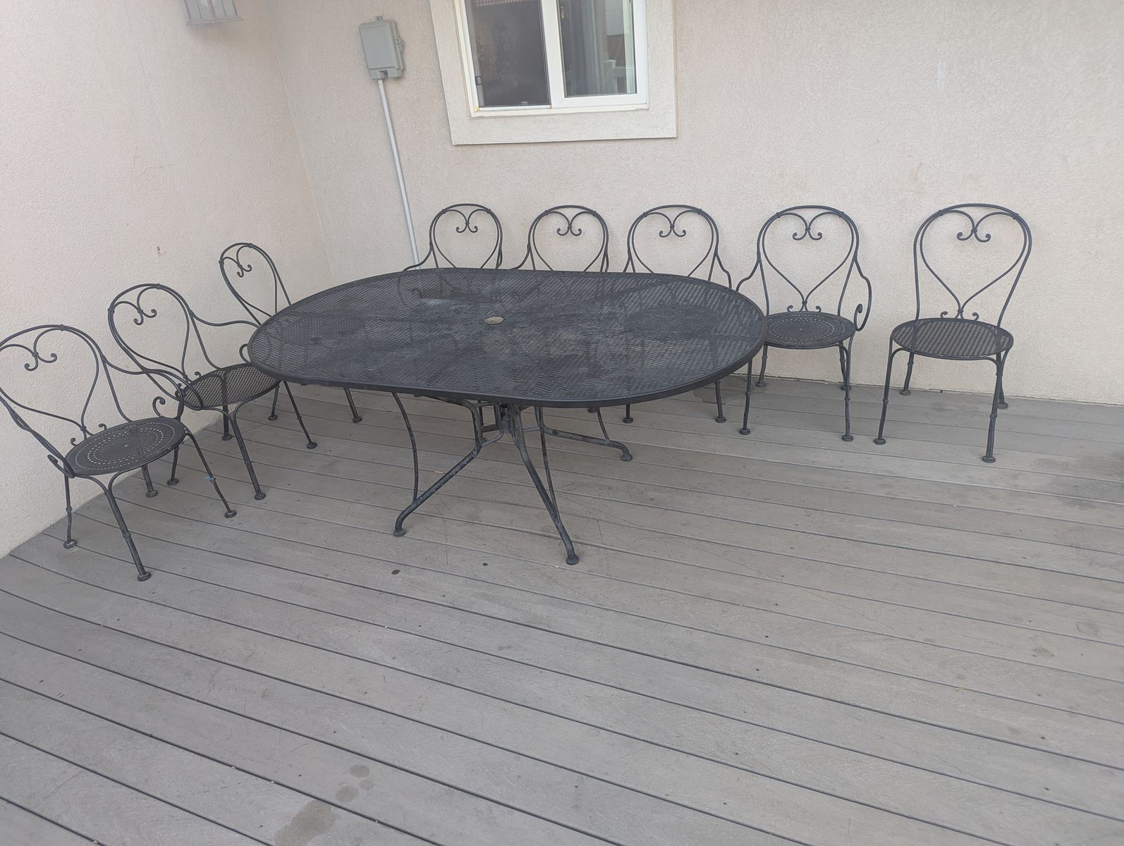 Patio Table Light with Eight Chairs and Cushions