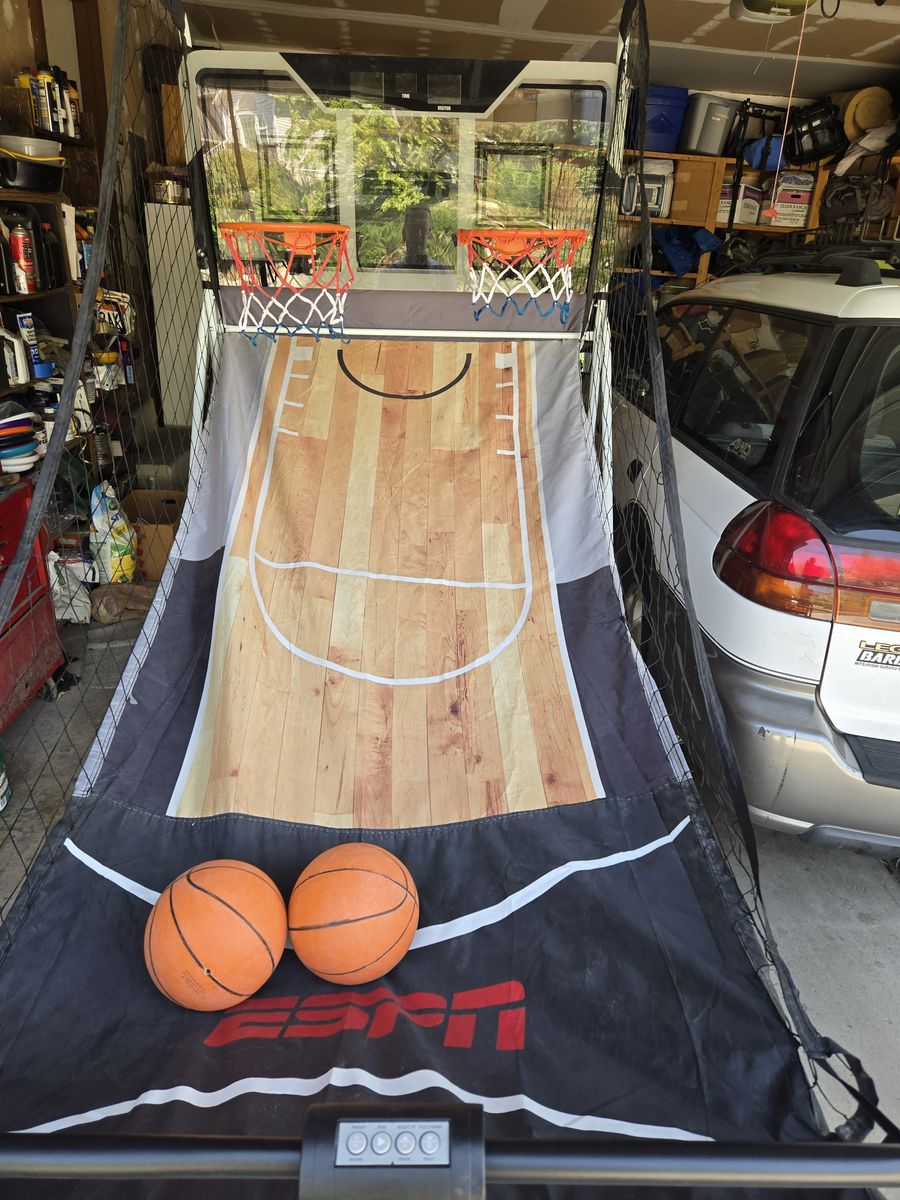 Indoor electronic basketball game for two