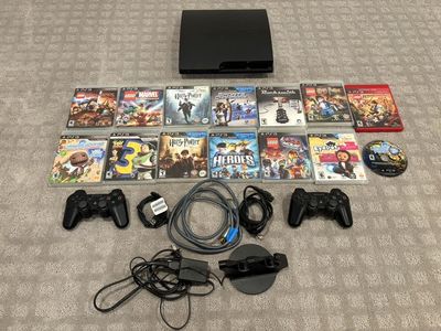 PS3 Slim Bundle W/14 Games, 2 Controllers