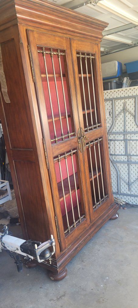 Ornate Wood Bookcase with metal  Doors & Red Fabric Backing, Display Cabinet