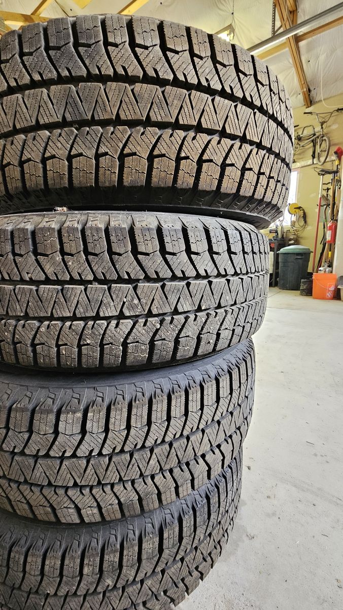 Bridgestone Blizzak Studless Snowtires and alloy wheels.