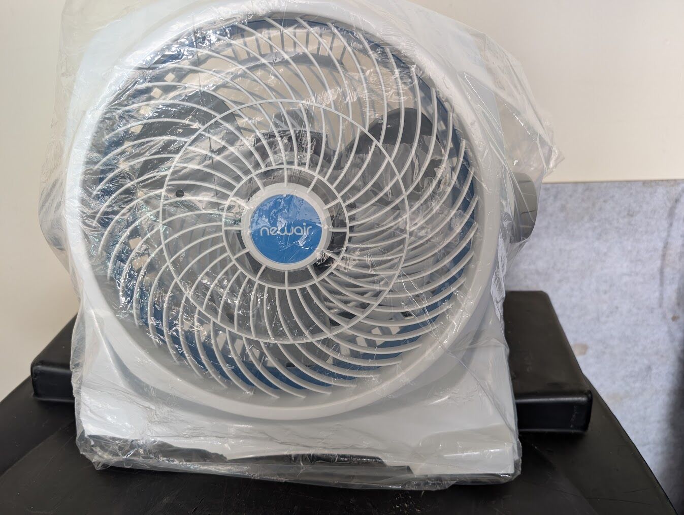 Newair 12" Air Circulator Portable Fan with 360* Pivot, Floor/Wall # NFN12AWH00-New with slight damage to frame