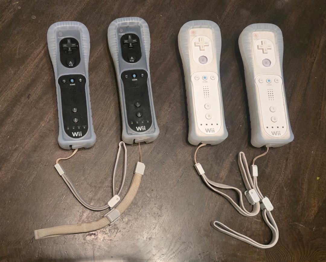Nintendo Wii controllers with covers $20 each! trades considered!
