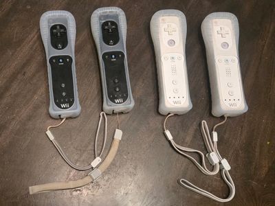 Nintendo Wii controllers with covers $20 each! trades considered!
