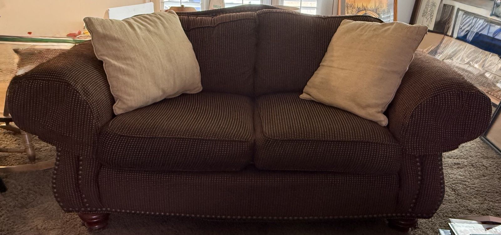 Brown love seat couch