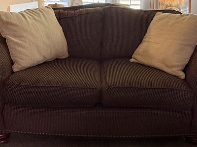 Brown love seat couch