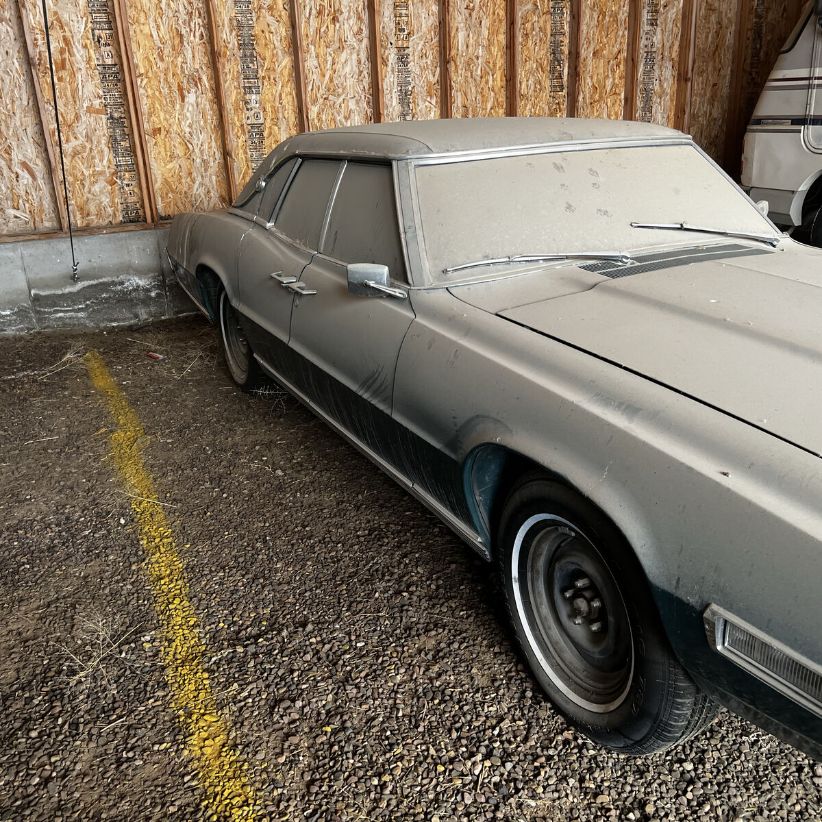 1969 suicide 4 door Ford Thunderbird
