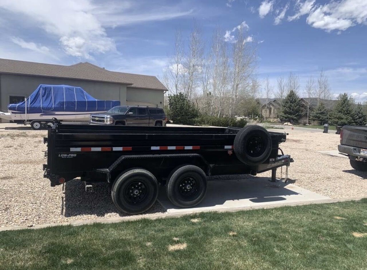 2022 PJ Low-Pro Dump Trailer - Tandem Axle, Includes Ramps & Spare Tire