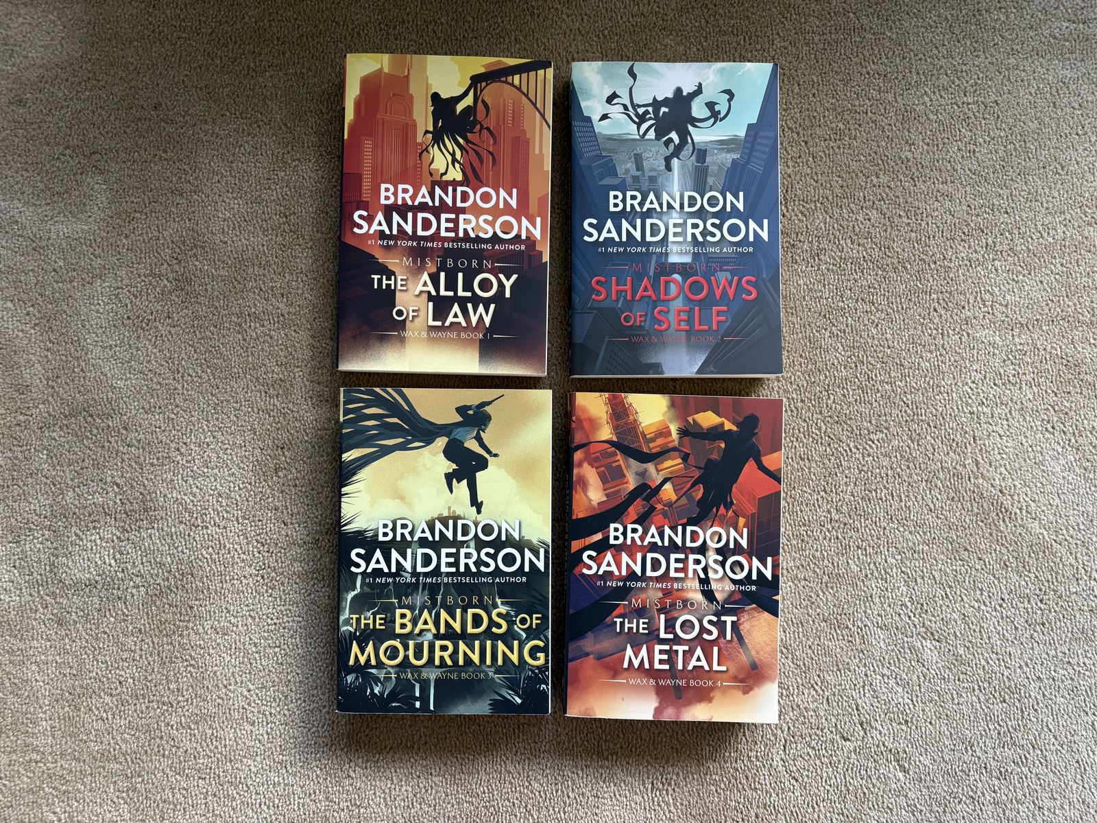 Complete The Mistborn Saga: Wax & Wayne Series, Books 1-4, by Brandon Sanderson (paperbacks)