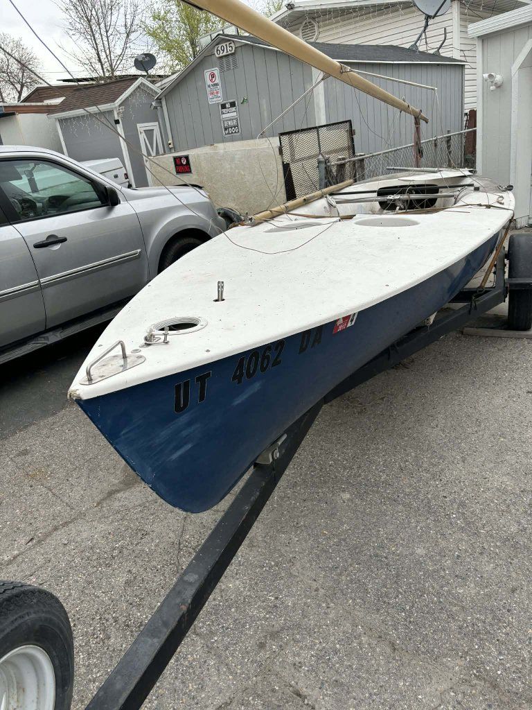 nice smaller sail boat with all sails and rigging