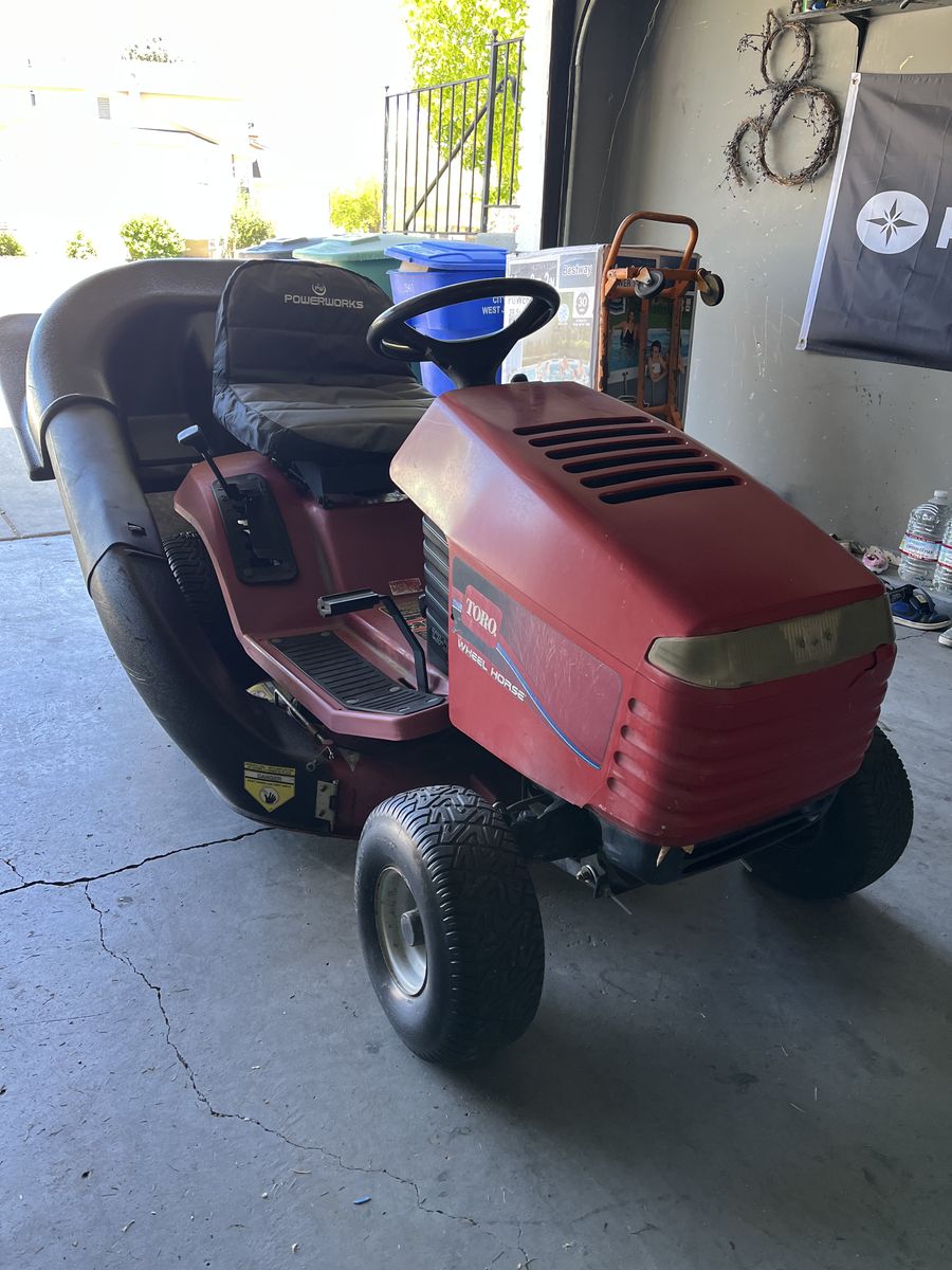 Toro Wheel Horse riding Lawnmower