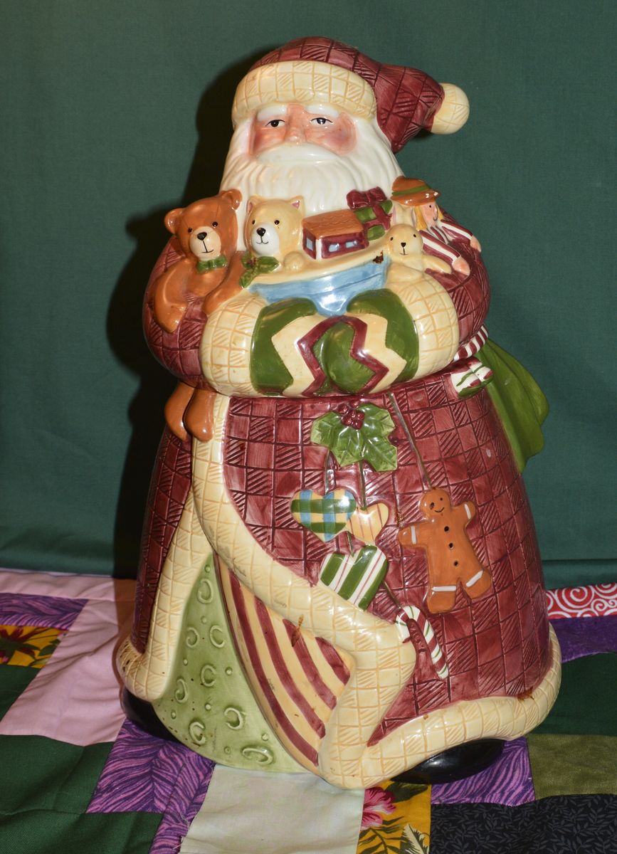This is a Susan Wingert Father Christmas (or Santa with Toys) cookie jar