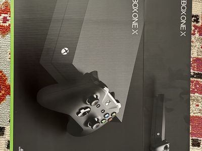 Xbox One X 1TB Console, 4K HDR Gaming System, with 3 wireless controllers