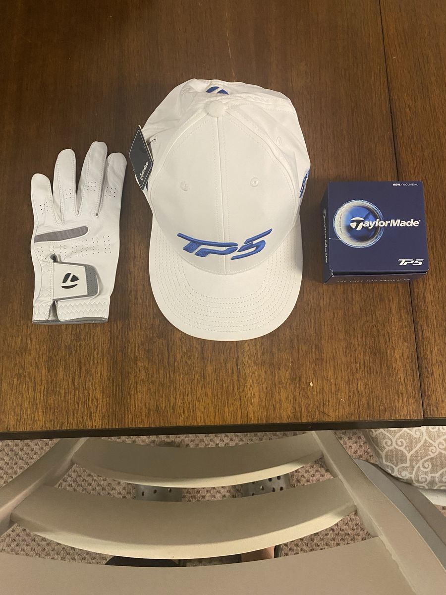 Taylormade TP5 golf hat, balls, and golf glove $30