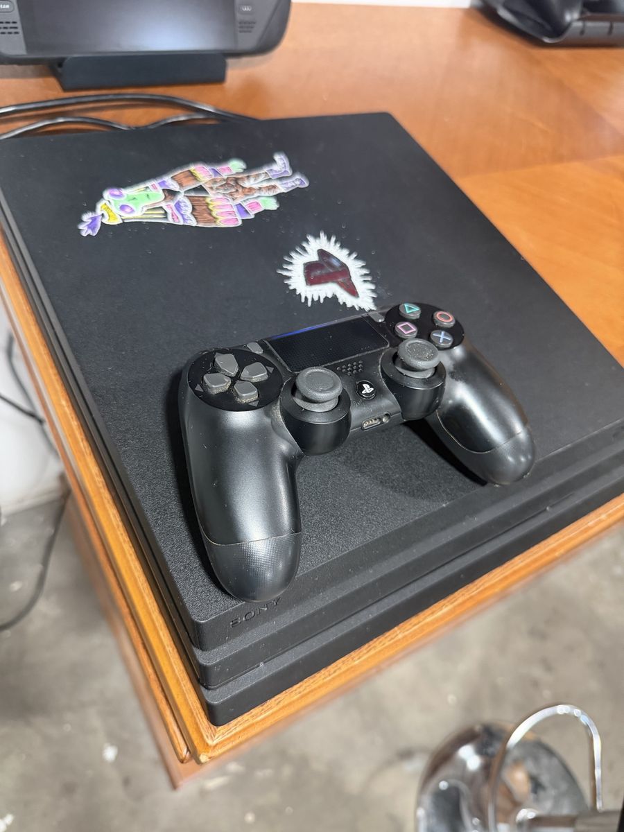 Sony PlayStation 4 Pro PS4 Pro Console 1TB  Black with Black or Steel Grey Camo Controller