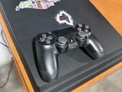 Sony PlayStation 4 Pro PS4 Pro Console 1TB Black with Black or Steel Grey Camo Controller