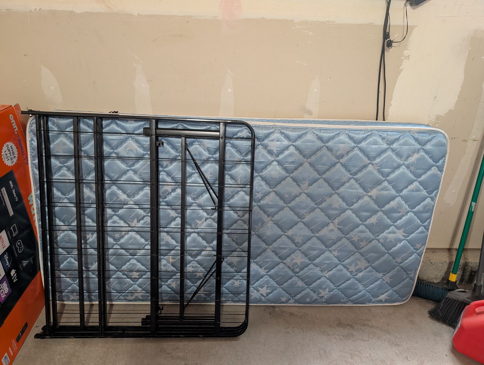 Single size cot and mattress. 