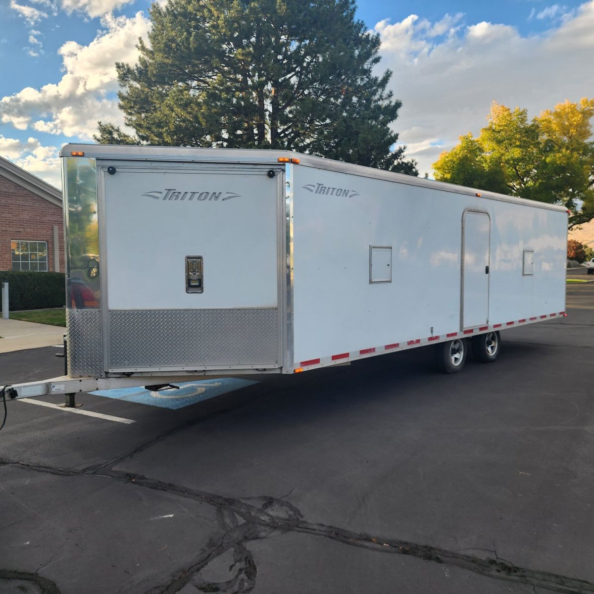 All aluminum Triton 24ft snowmobile trailer. 