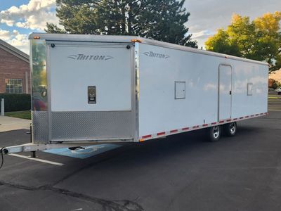 All aluminum Triton 24ft snowmobile trailer.