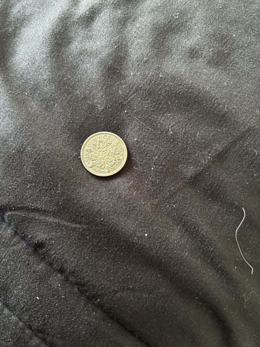 1928 six pence coin