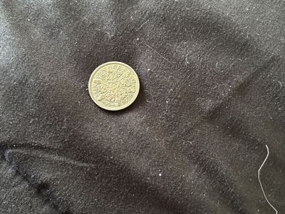 1928 six pence coin