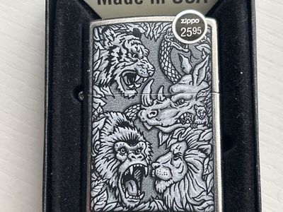 Zippo Jungle Animals Embossed Windproof Pocket Lighter (Model 48567) NIB