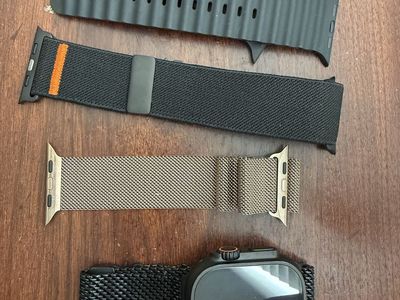 Apple Watch Ultra GPS + Cellular 49mm Smart Watch with Black & Gold Bands