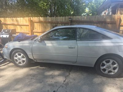 toyota solero car for sale it's a great running car it has230,000 miles and it runs so quite and doesn't have a miss or anything