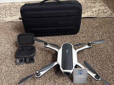 GoPro Karma Drone with Case, Controller, and 1 Hero6 Session Cameras and 1 Black7