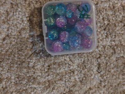 Assorted Blue and Purple Crackle Beads in Small Plastic Storage Container