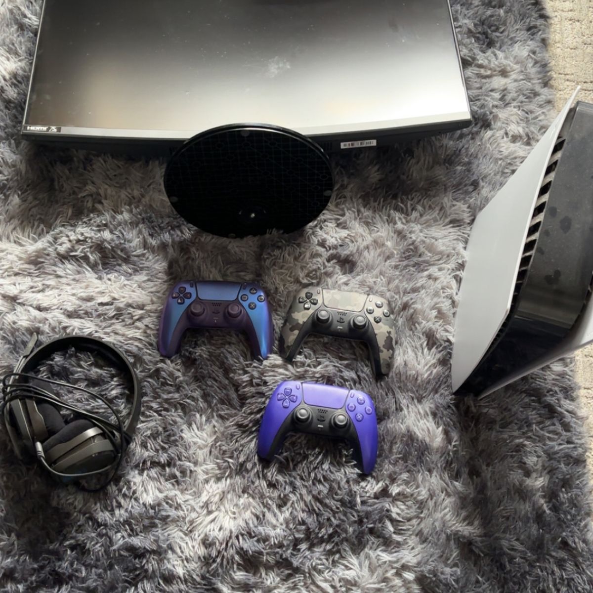 PS5 with 3 controllers, a monitor, and headset