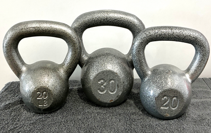 Three Cast Iron Kettle Bells
