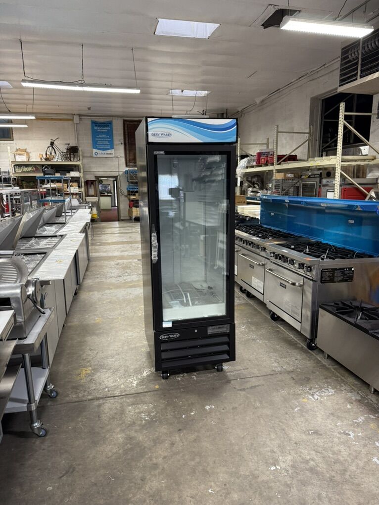 New One Door Glass Merchandiser 23  Cu Ft 115 volts with wheels for easy moving