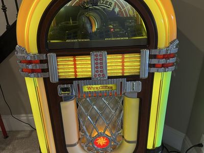 WURLITZER JUKEBOX WITH CD’s