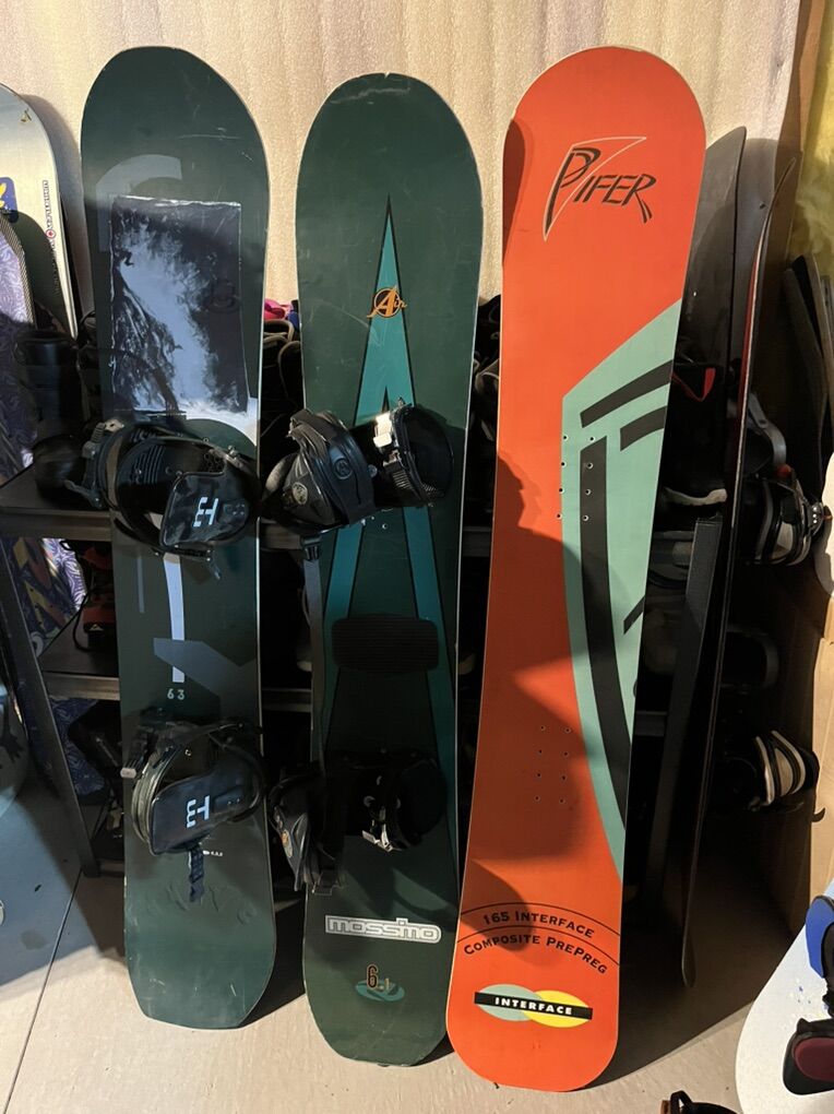 three Vintage One Direction Snowboards