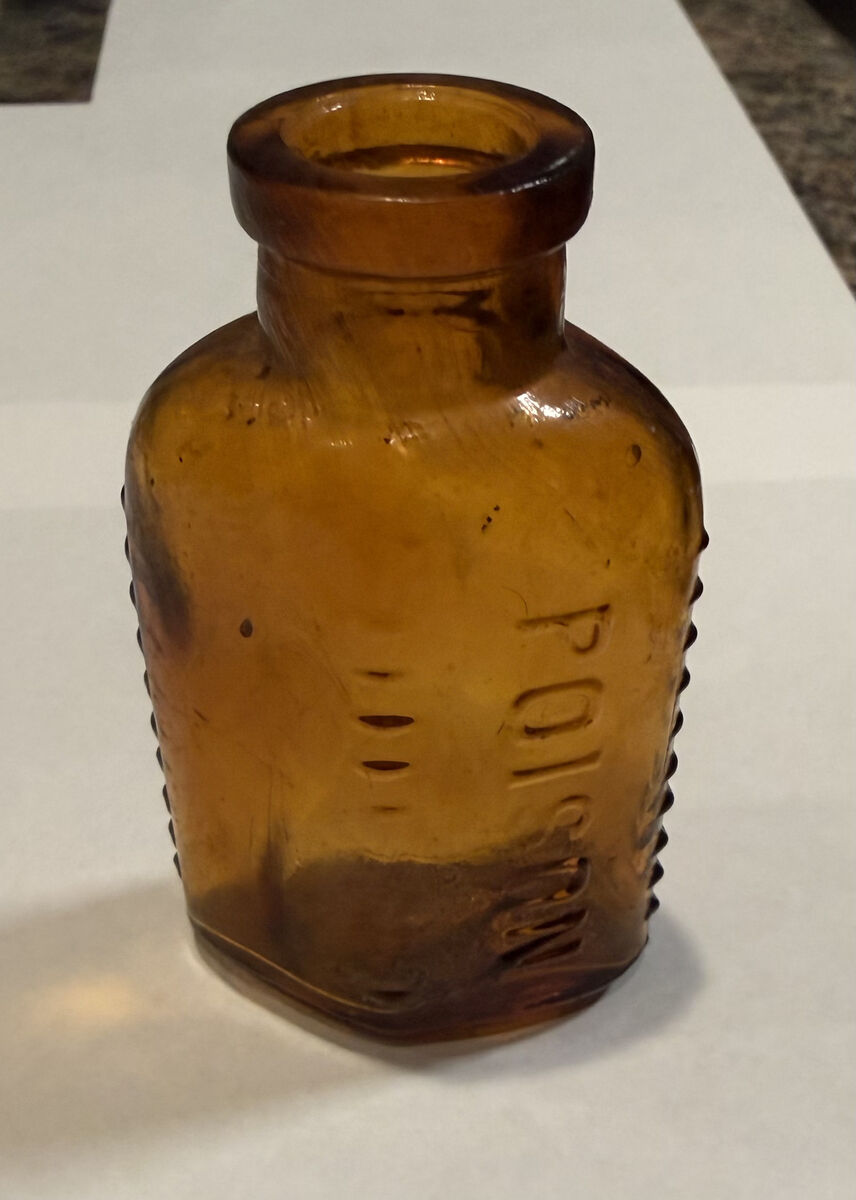 Vintage 3-Sided (2 3/4" tall) Amber Poison Embossed Bottle