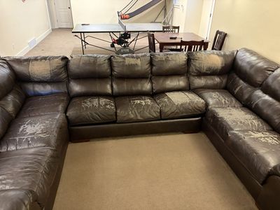 Dark brown faux leather sectional