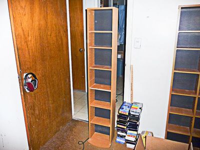 Adjustable Laminated Particle Board Shelf Unit.