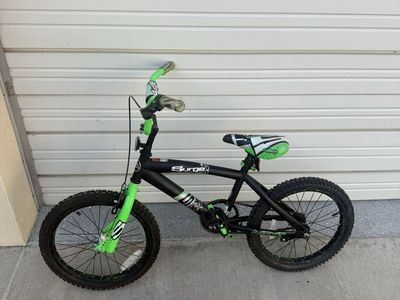 18 inch Surge BMX bike Black with green highlights. Excellent condition