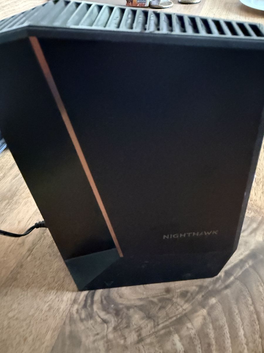 Netgear Nighthawk CM2000 Cable Modem & RAX70 Tri-Band WiFi Router