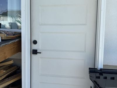 31.5" W x 80" H Primed Steel 5-Panel Prehung Exterior Door - Right Inswing