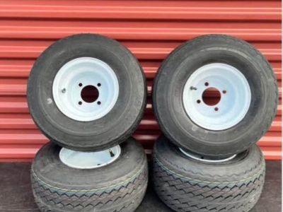 Brand New Set of 4 Wanda 18X8.5-8. Golf Carts Tires Mounted on New White Wheels Standard 4 Lug. Never Used
